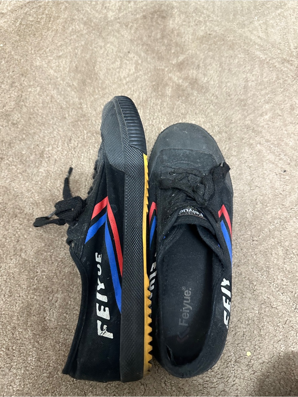 Feiyue Men's Black Canvas Sneakers with Red & Blue Stripe Accents